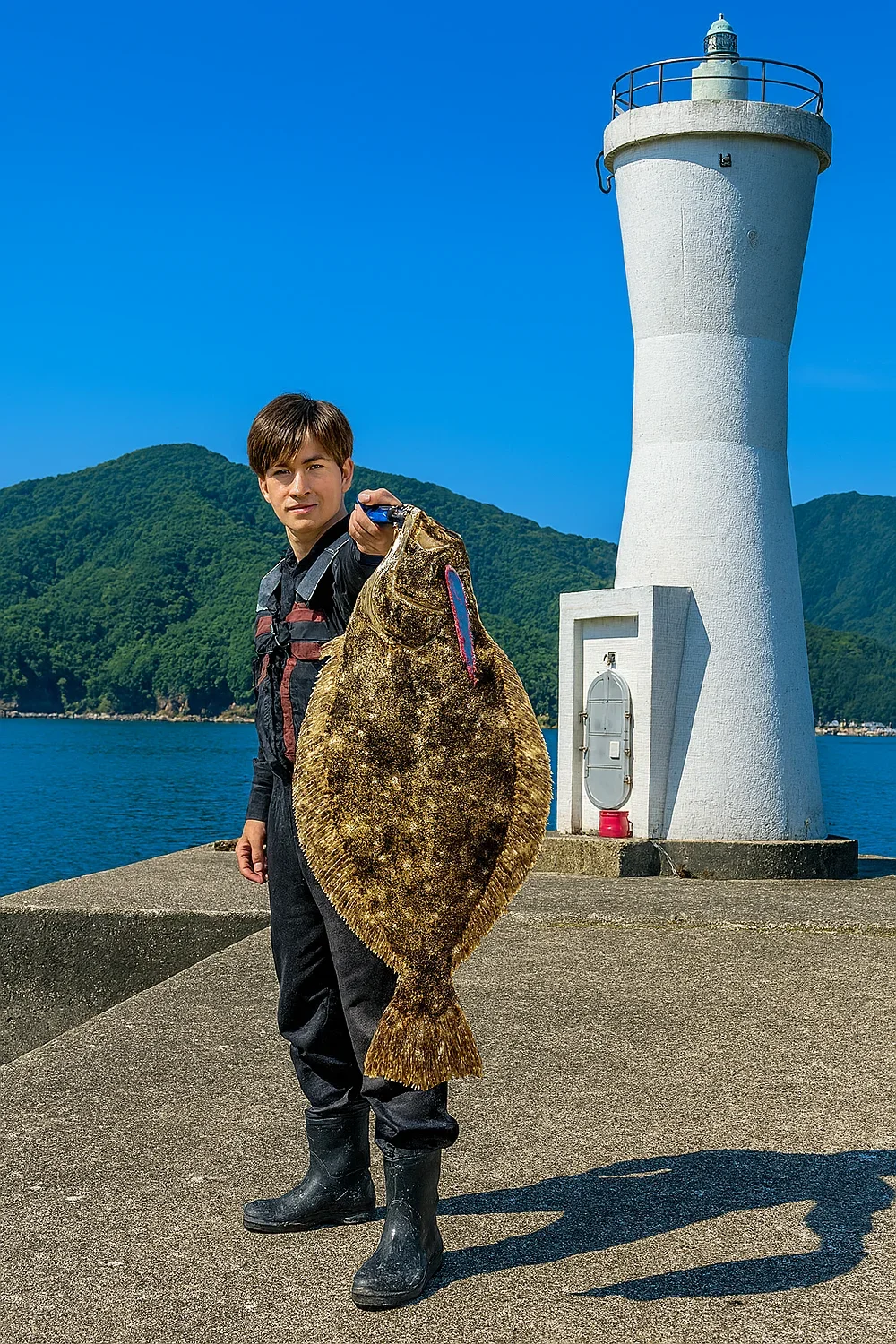 香住西港でヒラメを釣る久良木