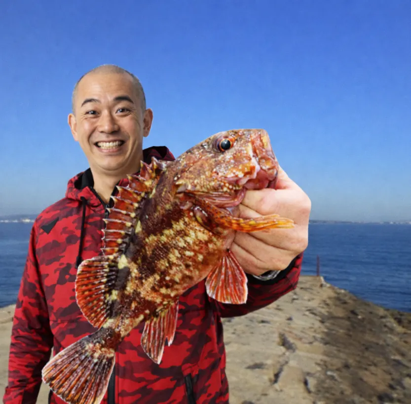 りんくう公園でガシラの釣果を得たがんだま君.webp