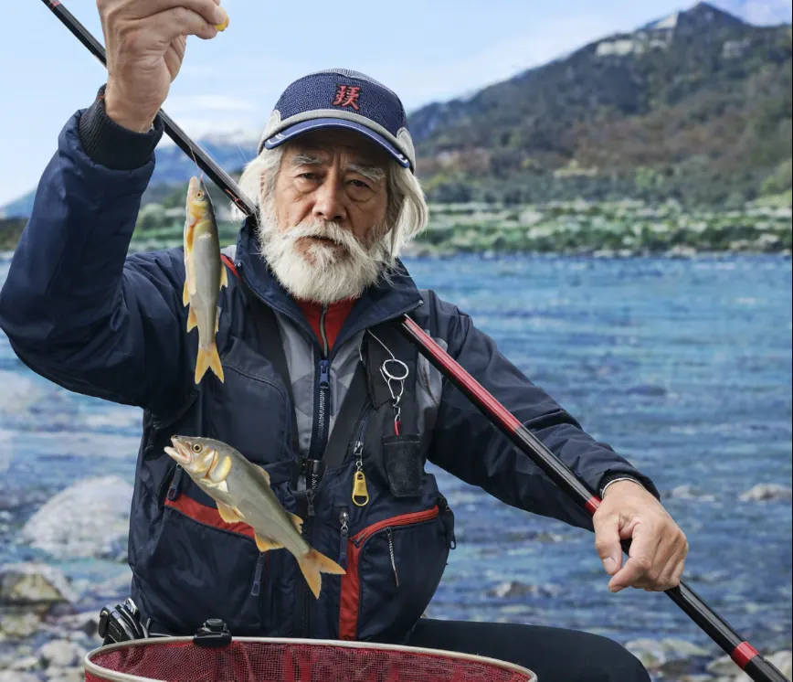 九頭竜川でアユの釣果を得た米田.webp