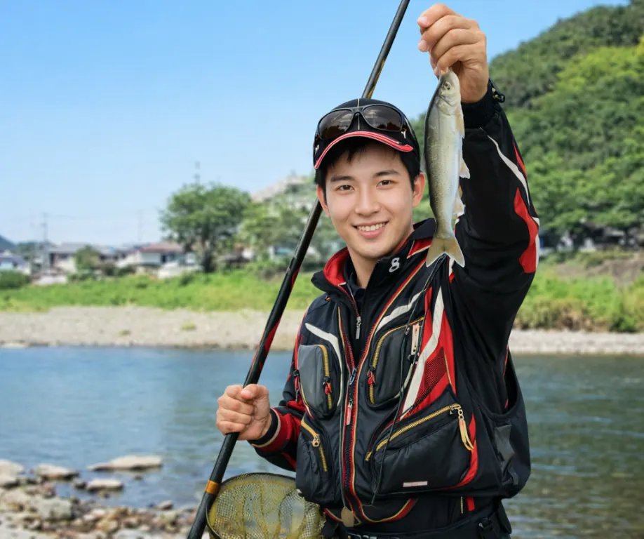 仁科川でアユの釣果を得た新崎.webp