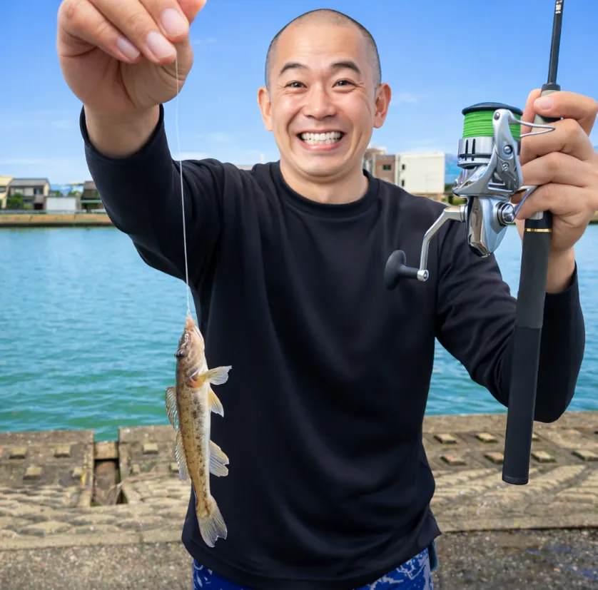 白岩川でハゼの釣果を得たがんだま君.webp