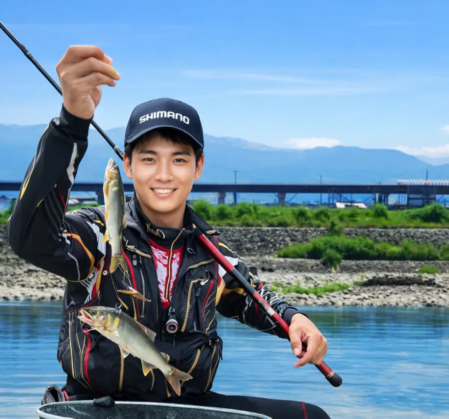 神通川でアユの釣果を得た新崎.webp