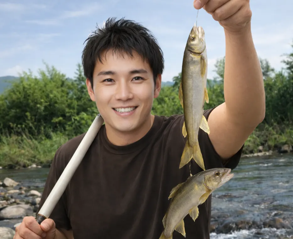雫石川でアユの釣果を得た新崎.webp
