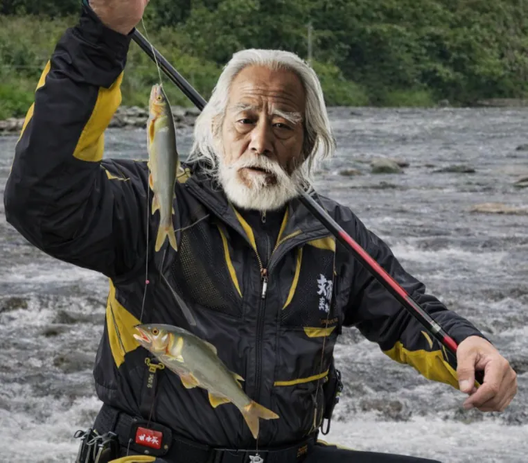 依田川でアユの釣果を得た米田.webp